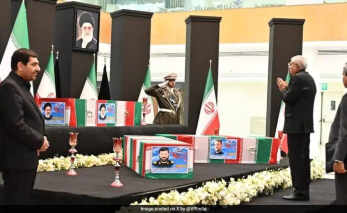 Shri Jagdeep Dhankhar paying tributes to H.E. President Dr. Seyyed Ebrahim Raisi