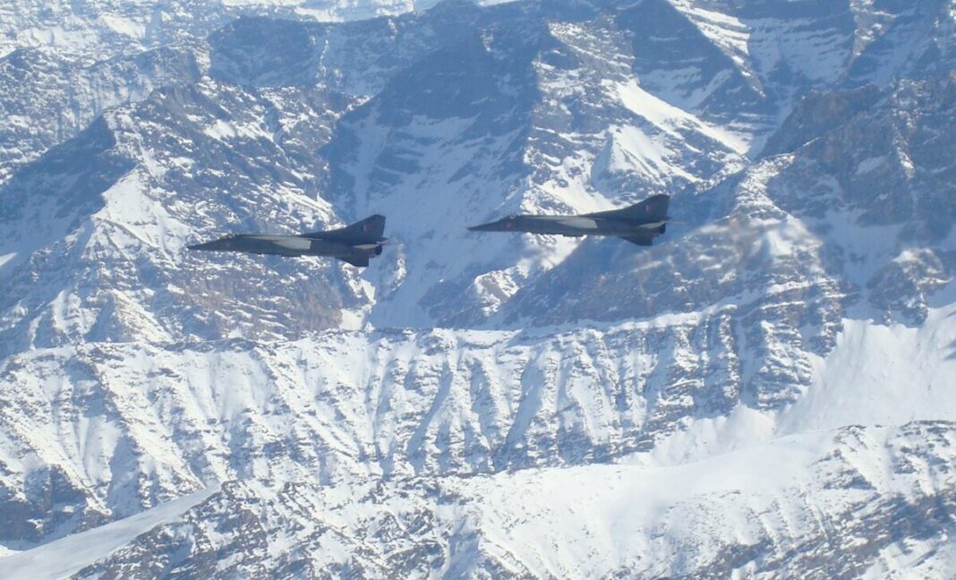 A pair of MiG-23BNs flying over the Himalayas
