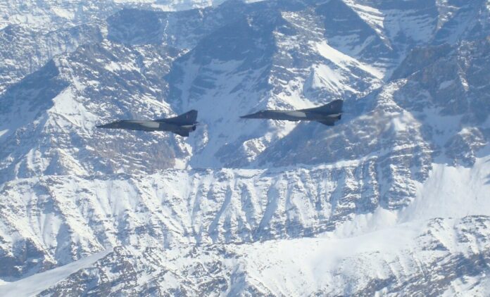 Image _ A pair of MiG-23BNs flying over the Himalayas